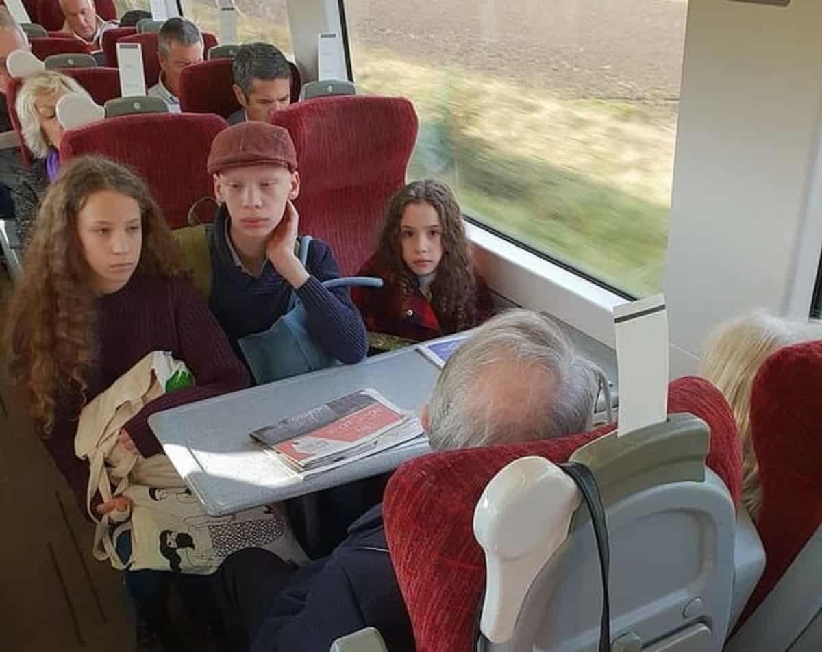 An elderly couple refuses to move from seats reserved for kids