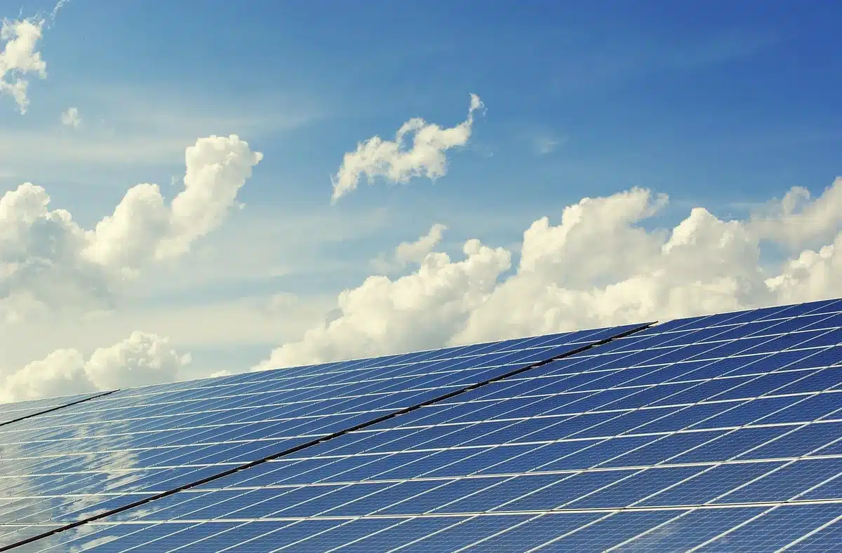 Rows of photovoltaic solar panels generating renewable electricity