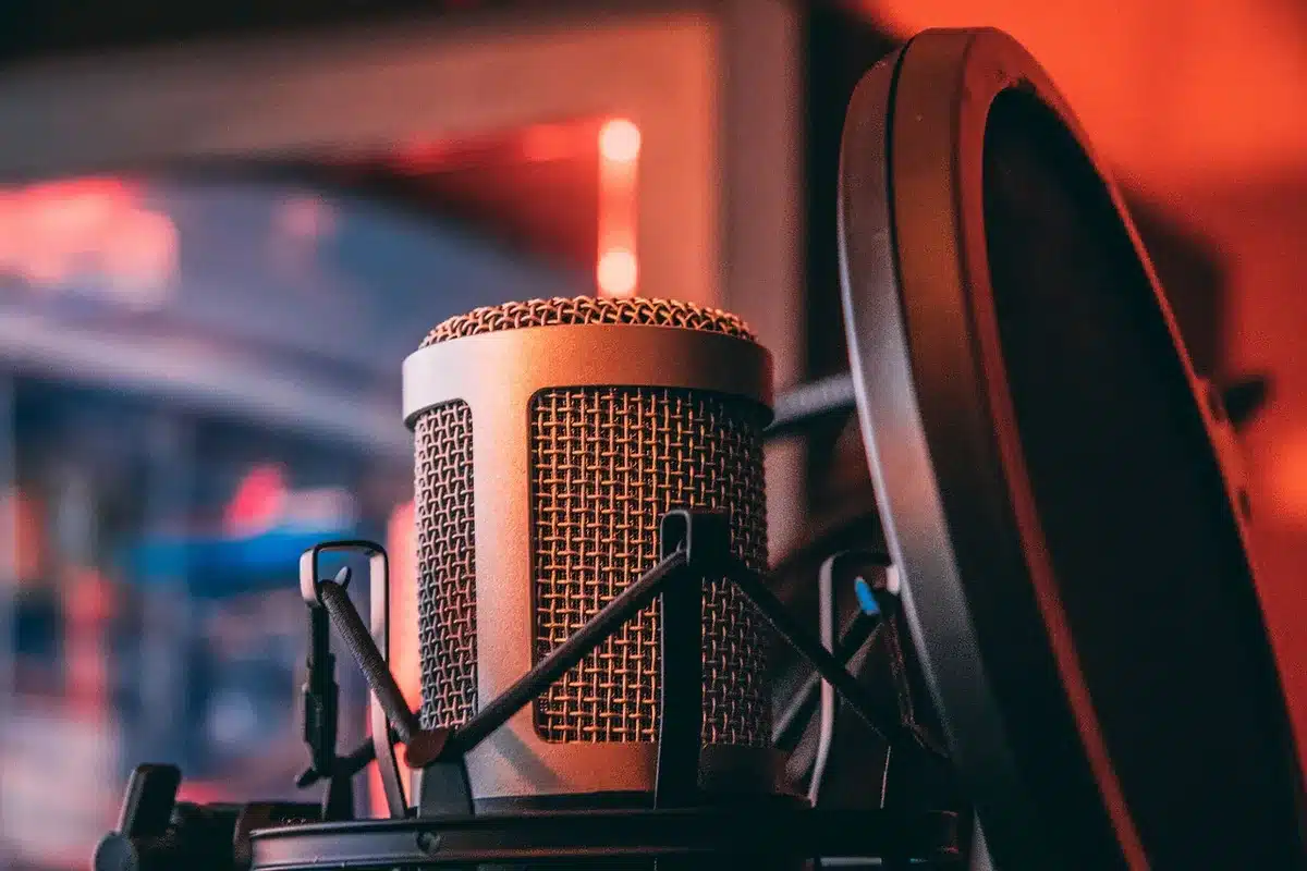 Podcast recording studio setup with microphone and headphones for investigative journalism