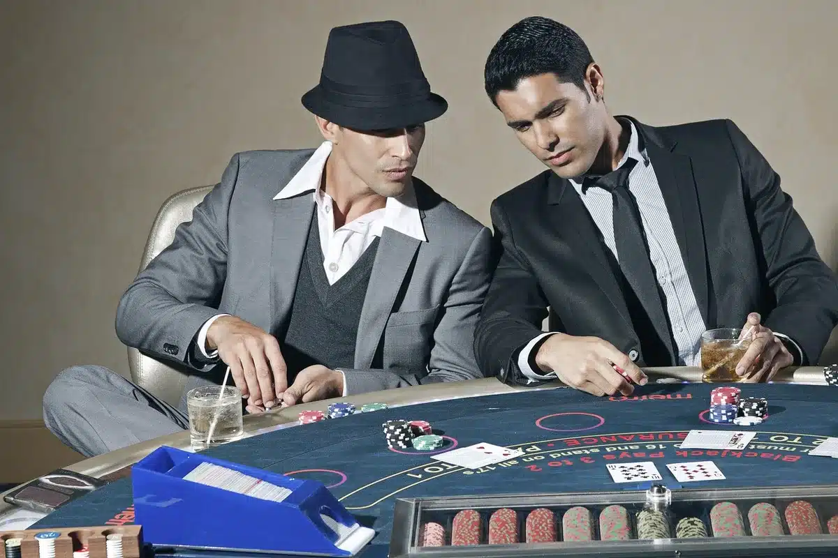 Poker players in an intense moment at the table during high-stakes play