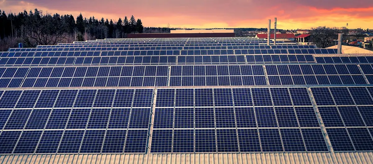 Solar panel array powering irrigation systems in agricultural setting