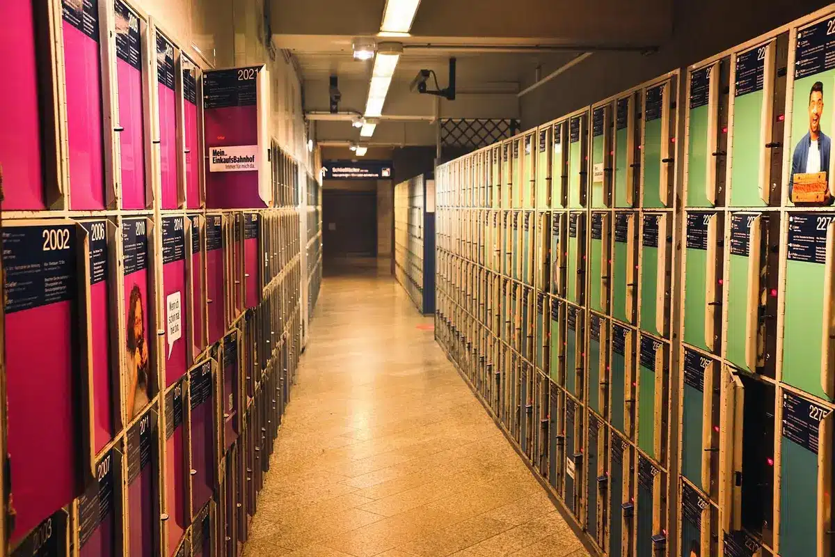 NHL team locker room during offseason with equipment and roster planning materials