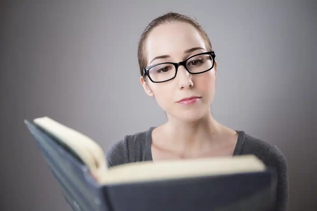 Adult newcomers in a classroom learning a language