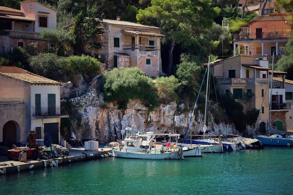 Coastal terraced slopes with greenhouses and sheltered microclimates
