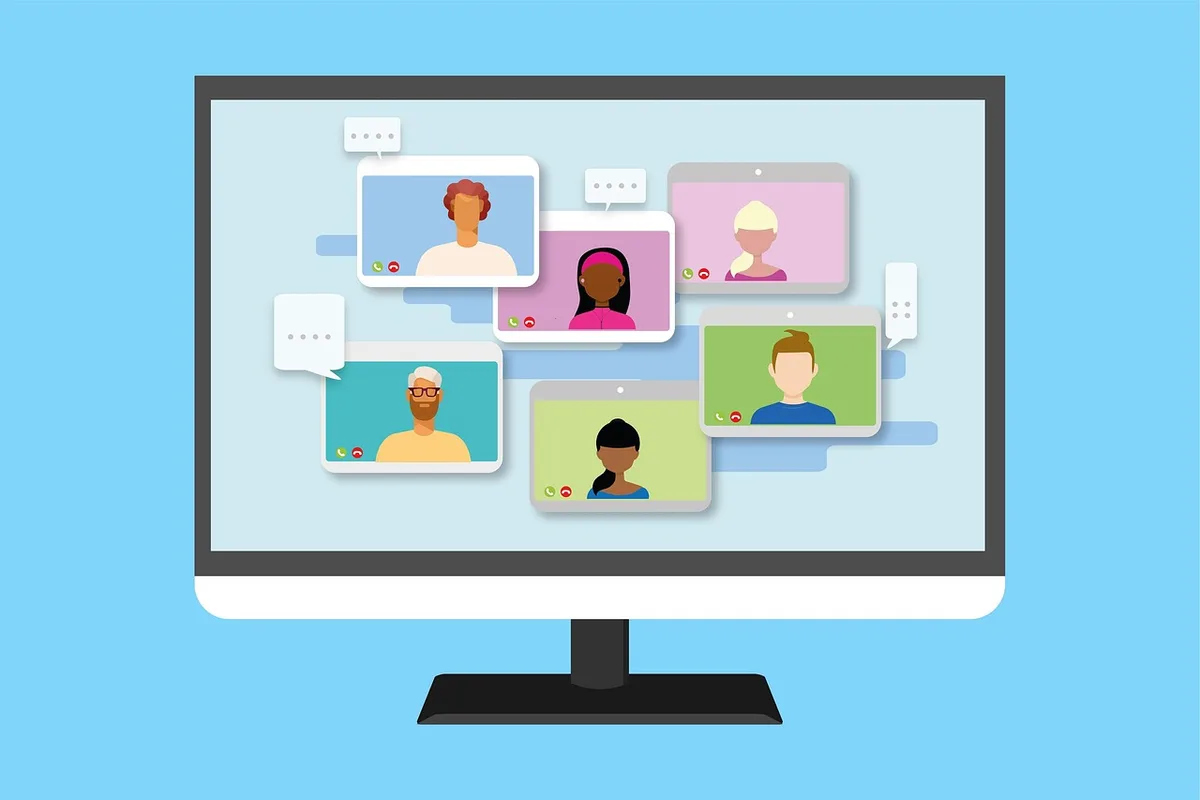Anonymous video call grid on a laptop screen suggesting a cast reunion announcement
