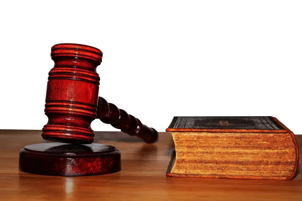 Gavel and legal books symbolizing debate over speech and criminality
